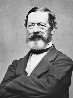 Black and white portrait of John H. B. Latrobe standing