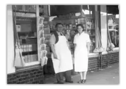 John and Maria Re outside the original The Re Store, c. 1939 (01).png