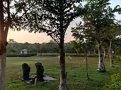 Trees and topiaries in the circular garden of Kadri Park in Mangaluru