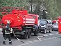 Fire engines and emergency service personnel responding to an incident in Kyiv, 2010
