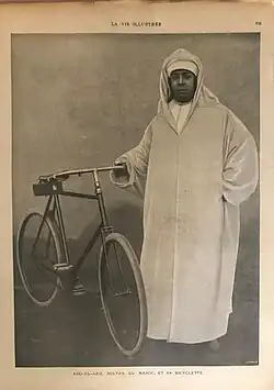 Image 47Sultan Abd-al-Aziz with his bicycle in 1901. The young sultan was noted for his capricious spending habits, which exacerbated a major trade deficit. (from History of Morocco)