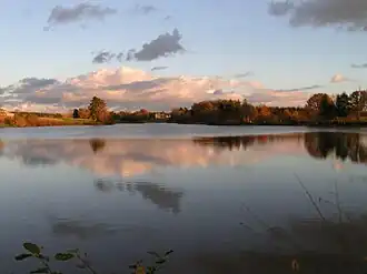 The château of Rortheau beyond the lake