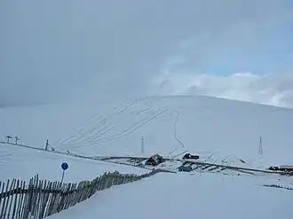 The Lecht Ski centre base lodge, viewed from the Eagle ski runs. The Buzzard poma can be seen in the background.