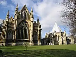 East end of Lincoln Cathedral, with wall buttress, and chapter house with flying buttresses. (1185–1311)