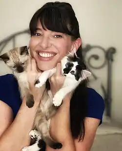 Lindsey with two foster kittens in 2020