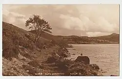 A 1920s postcard picture showing the route of the Pandora to Klondyke tramway along the shore of Llyn Geirionydd, before construction of the present road
