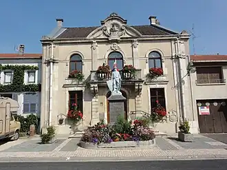 The town hall and war memorial in Lucey