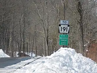 Signage off the Little Equinunk Bridge for Manchester Township and Route&nbsp;191.