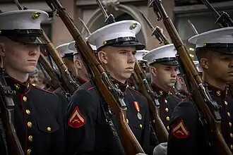 Lance Cpl. Jared A. Gratner, rifleman, Silent Drill Platoon, marches during a parade for the Norwegian Military Tattoo at the Oslo Spektrum in Oslo, Norway, Apr. 26, 2024