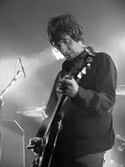 Collins performing in 2008