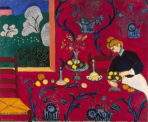 An abstract painting of a woman sitting next to a dining table.