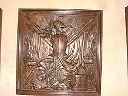 Military-themed metal plate exhibited in the Musée national de la Marine.