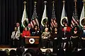 First Lady Michelle Obama and Secretary of the Interior Ken Salazar, joined by some of the department's longest-serving employees on stage, thanked all employees for their service at a ceremony at Sidney R. Yates Auditorium at Main Interior.