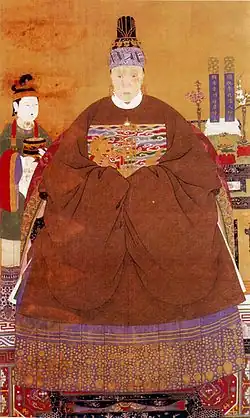 Noble lady wearing a round-collared jacket as upper garment and a skirt as lower garment (front) Lady-in-waiting wearing a short-sleeved round collar jacket with a skirt (left), Ming dynasty.