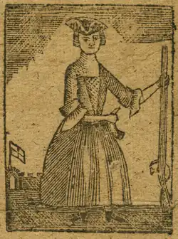 A woodcut of a woman. The color is mostly brown with black lines. The woman stands center, wearing a tricorn hat and a dress with sleeves to her elbows and a skirt to her shoes. She faces the viewer. In her left hand she holds the end of a rifle, its buttstock resting on the ground. Her right arm crosses her waist with her hand clasping something at her left hip that is curved; possibly a horn? Or a waterskin? In the background in the lower left, a flat waves off in the distance.