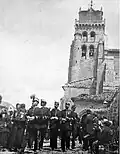 View of the monastery during Fiesta of El Curpillos's celebration. Late-19th century.