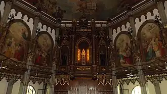 Statue of the Holy Infant of Prague enshrined in the cedar wood retablo