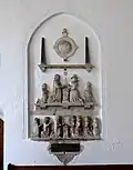 Monument to Richard Stone (d.1607) and family, Holme-next-the-Sea, Norfolk. The monument has been reassembled on the wall and is lacking its original architectural surround and backing.