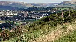 Looking east from Werneth Low towards Mottram with the hills of the Peak District in the background