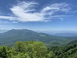 Mt Iizuna with Mount Reisenji (left), Mount Menou (front centre), and Togakushi Ski Field (right) (June 2023)