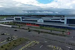 Exterior view of the airport terminals, with Terminal A (left) and Terminal B (right)