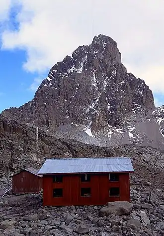 Austrian Hut is found near the Lewis Glacier on the slopes of Point Lenana. The hut sleeps 30 people, with Top Hut nearby for porters.[34]