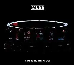 Cover for Muse's "Time is Running Out", showing various military officers standing by a round table and saluting. The band logo is at the top and the song title is written at the bottom.