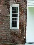 Front East Side Window - Shows remains of older door opening