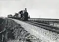 A locomotive of the series 7100 of the N.S. with a train between Hantum and Ternaard (April 1935)