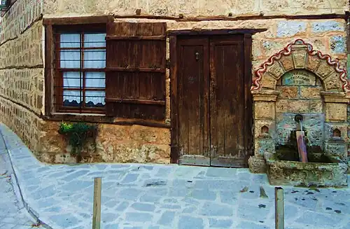 Traditional building and fountain, in the city center