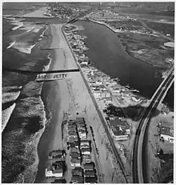 Naval Ammunition and Net Depot. Aerial view of jetty and coastline, WW2 era