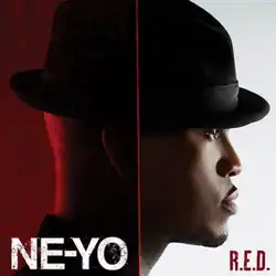 A near-closeup of Ne-Yo in profile looking to the right with a fedora. Half of the image shows the back of his head behind a red background with little to no lighting while the other half shows him behind a white background with light. The left half shows the artist name, "NE-YO", in white text while the other half shows the album's title, "R.E.D." in red text.