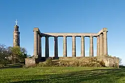 Image 15The National Monument of Scotland (right) and Nelson Monument (left)