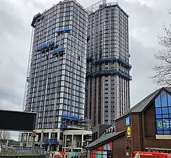 New homes under construction adjacent to the 17&Central shopping centre in 2024