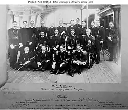 Staton as a midshipman, standing third from the right in the back row in this photograph of the officers of the protected cruiser USS&nbsp;Chicago, ca. 1903.