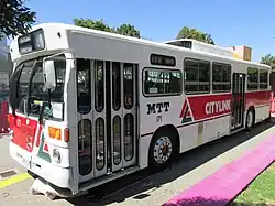 1970s white and red bus