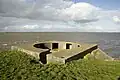 Remnant of an antiaircraft gun position built by the Germans in the Second World War along the coast at Termunten