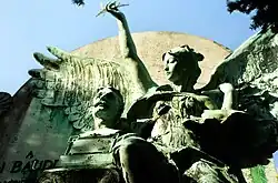 Part of composition on tomb of Paul Baudry. A winged angel is about to place a crown of laurels on Baudry's head.