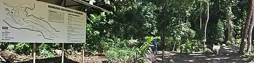 Panoramic photo of Botanical Gardens, Rove Honiara Solomon Islands. Note the hanging spot marked on the sign