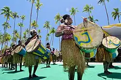 Tambur drum being played with a suling flute (center) in a Suling Tambur (flute-drum) combination in the Raja Ampat Islands.