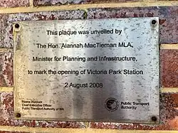 Metal plaque on brick wall