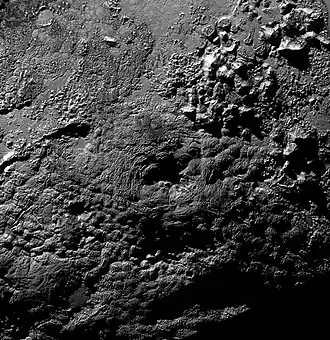 Wright Mons, a cryovolcano on Pluto
