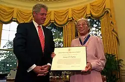 Rosa Parks receives the award from President Bill Clinton, 1996.