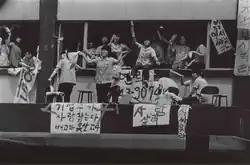 Demonstrators with signs