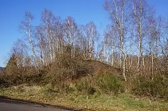 The Magny well slag heap.