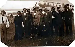 A Turkish State Airline Douglas DC-3 with a group of athletes on front