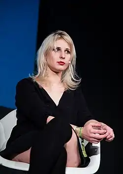 Maria Alyokhina seated onstage