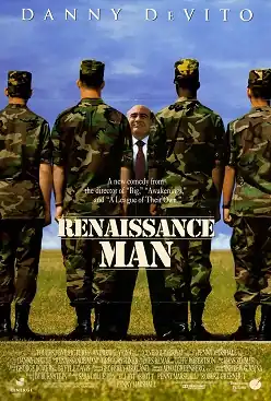 A short bald man in a suit and tie standing in front of four soldier in camouflage uniforms