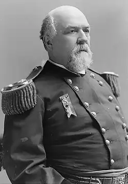 Black and white photo circa 1885 of brigadier General Robert Macfeely, seated, in dress uniform