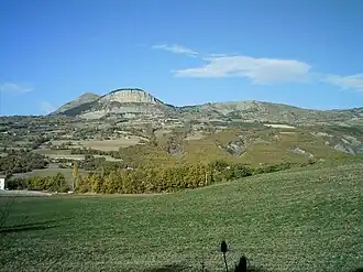 A view of La Rochette with Napoleon's Hat at 1,425&nbsp;m (4,675&nbsp;ft) and Puy de Manse at 1,646&nbsp;m (5,400&nbsp;ft)